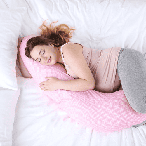 best way to sleep with pregnancy pillow