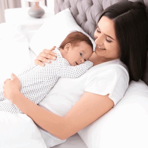 What’s Actually on My Nightstand During Postpartum Recovery (and Why It Matters)